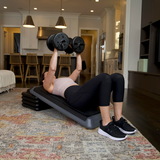 The Step Club Size Platform With Two Freestyle Risers and Two Original Risers from Lifeline Fitness for Fitness and Home Gym, in Grey.